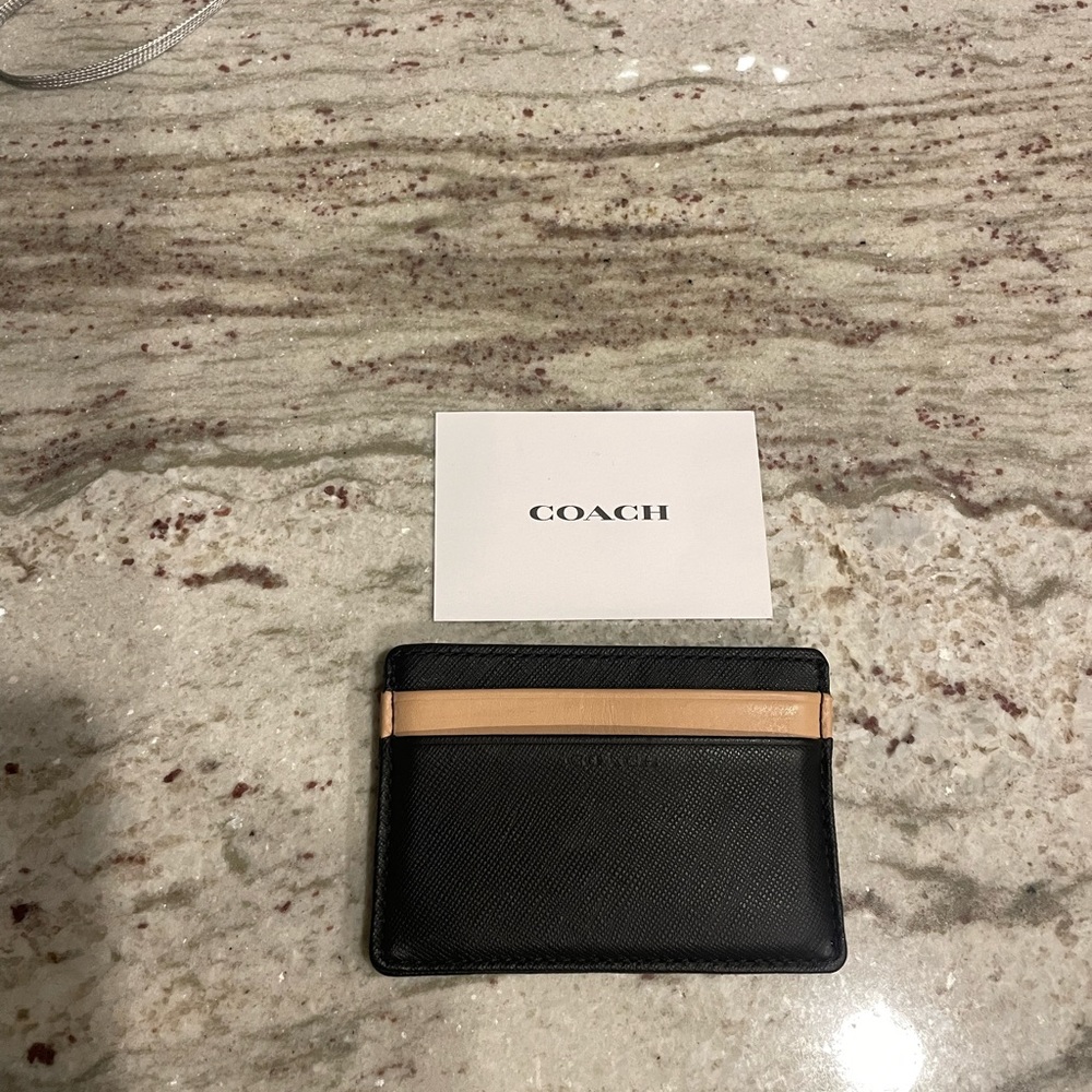 Men’s coach card holder/wallet.